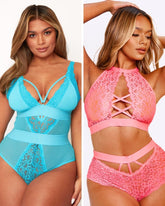 Two women wearing blue and pink lace lingerie sets on a plain background