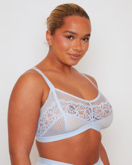 Side profile of the Tutti Rouge Frankie Bralette in Ballad Blue paired with the matching Frankie Brazilian Brief, highlighting soft floral lace, lightweight mesh and an effortless everyday fit.