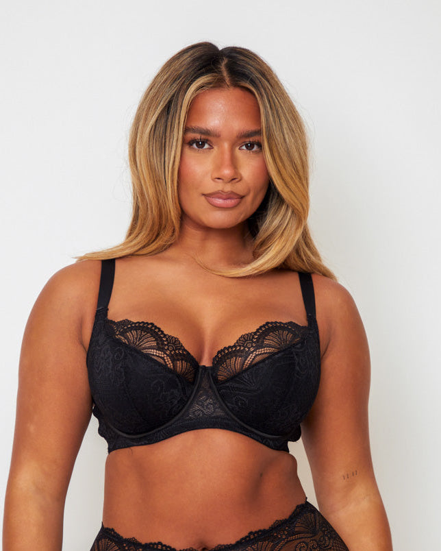 Front close-up of the Tutti Rouge Tutti Booster Lace Fuller Bust Bra in Luscious Liquorice showcasing supportive underwired cups with intricate black floral lace.
