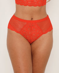 Red lace lingerie set on a plain background