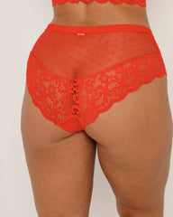 Red lace underwear on a plain background