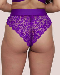 Purple lace lingerie set on a plain background