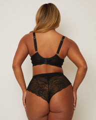 back view of woman wearing a Tutti Rouge lace plunge bra and matching brazilian in midnight black