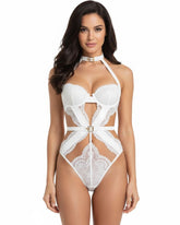 White lace lingerie set worn by a model on a white background