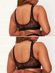 Black lace bra worn by a model on a plain background