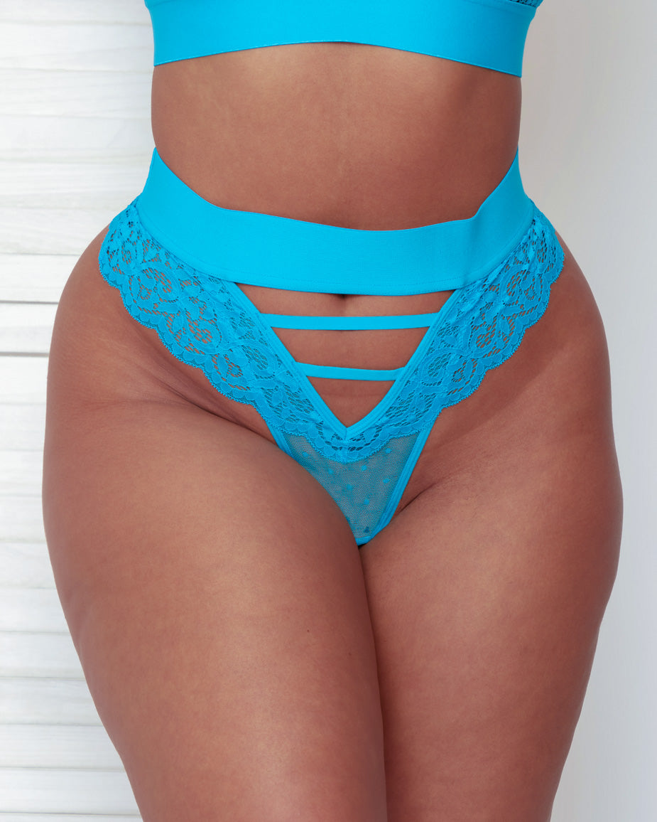 Close-up front view of the Amber Thong in Bluebird Blue, featuring a wide high-rise waistband, decorative strappy cut-out detailing, floral lace panels, and a sheer mesh front insert.