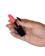 Hand holding a pink lipstick against a white background