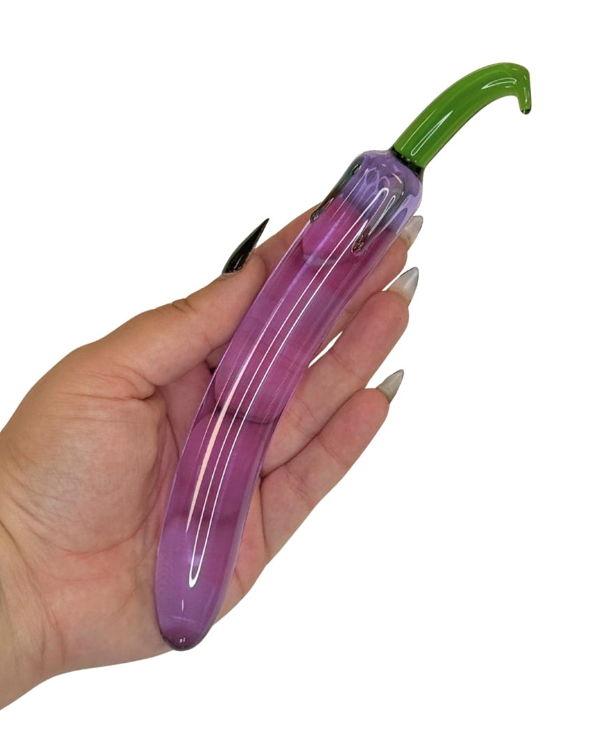 Purple Glass Toy from Brand X By Tutti inspired by the shape and look of an aubergine 
