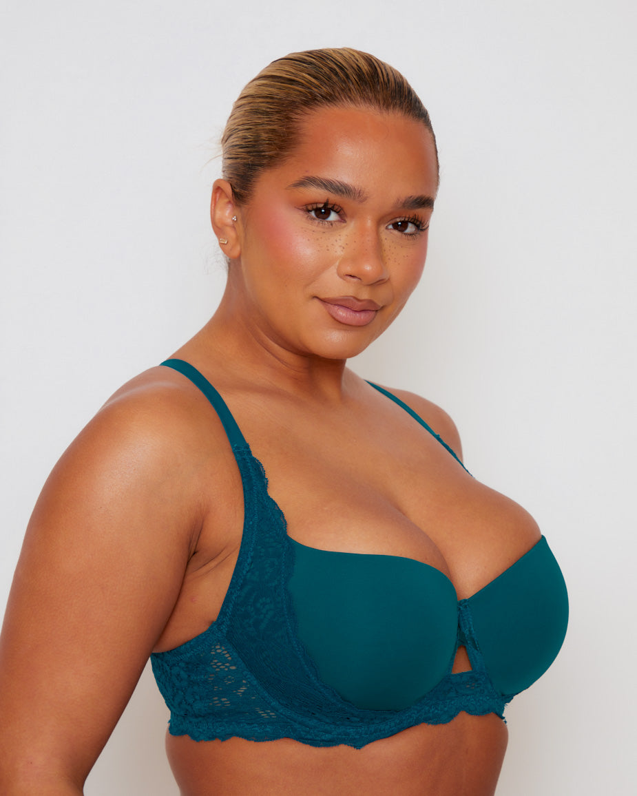 Angled front view of the Daley Lace T-Shirt Bra in Blue Coral, showcasing the supportive contour cups, soft lace trim, and flattering high-leg thong silhouette.