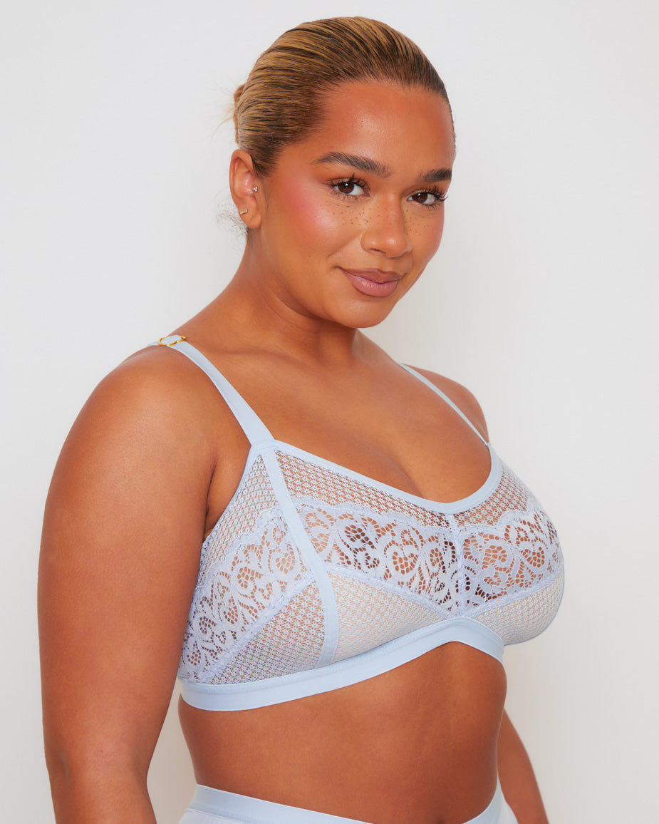 Side profile of the Tutti Rouge Frankie Bralette in Ballad Blue paired with the matching Frankie Brazilian Brief, highlighting soft floral lace, lightweight mesh and an effortless everyday fit.