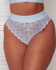 Close-up front view of the Hallie Brief in Ballad Blue, featuring delicate floral lace throughout, a wide soft waistband, and a flattering high-waisted silhouette with scalloped lace edging.