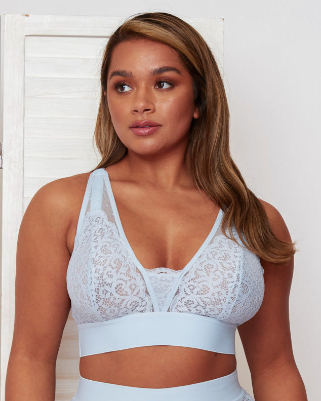 Front view of the Hallie Bralette  in Ballad Blue by Tutti Rouge, featuring soft floral lace, sheer mesh panels, a deep V-neckline, and wide supportive bands for a comfortable, feminine fit.