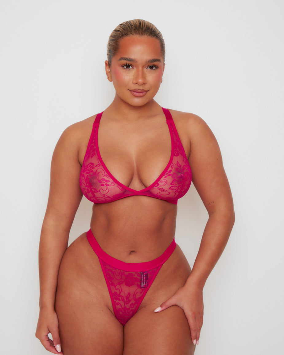 Full-length front view of the Millie-Mae Fullerbust Triangle Bralette and Thong Set in Very Cherry, featuring soft sheer floral lace, a flattering plunge neckline, and a matching no-VPL thong designed for curves.