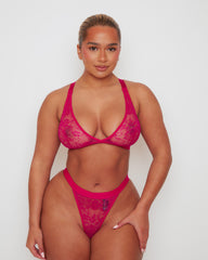 Full-length front view of the Millie-Mae Fullerbust Triangle Bralette and Thong Set in Very Cherry, featuring soft sheer floral lace, a flattering plunge neckline, and a matching no-VPL thong designed for curves.