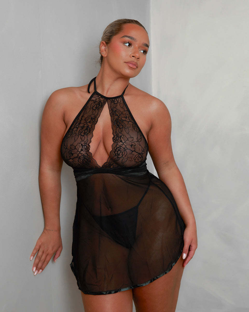 Front view of the Tutti Boudoir Jetta Babydoll in Onyx Black, showcasing the deep plunge lace cups, lightweight sheer mesh and flattering floaty silhouette designed to enhance your curves.