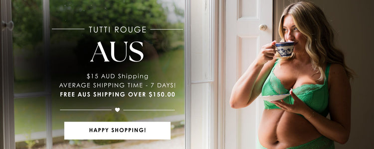 Tutti Rouge Australia promotional banner featuring a model wearing green lace lingerie while enjoying a cup of tea by a window, highlighting $15 AUD shipping, average 7-day delivery and free Australian shipping over $150.